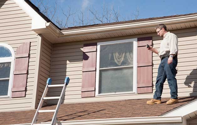 Professional spring roof inspection on a residential home in Mankato, Minnesota